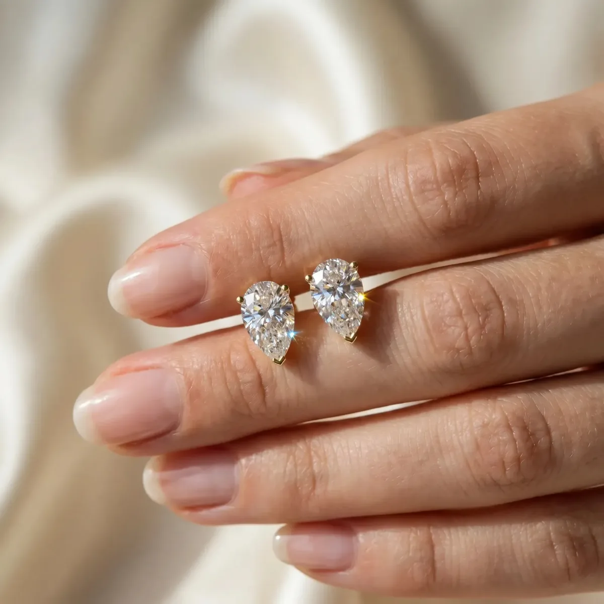Pear Cut Diamond Stud Earrings Yellow gold