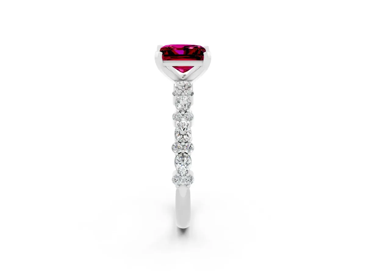 Princess Cut Garnet Side Stone Solitaire Ring with Round and Four-Prong Setting Silver