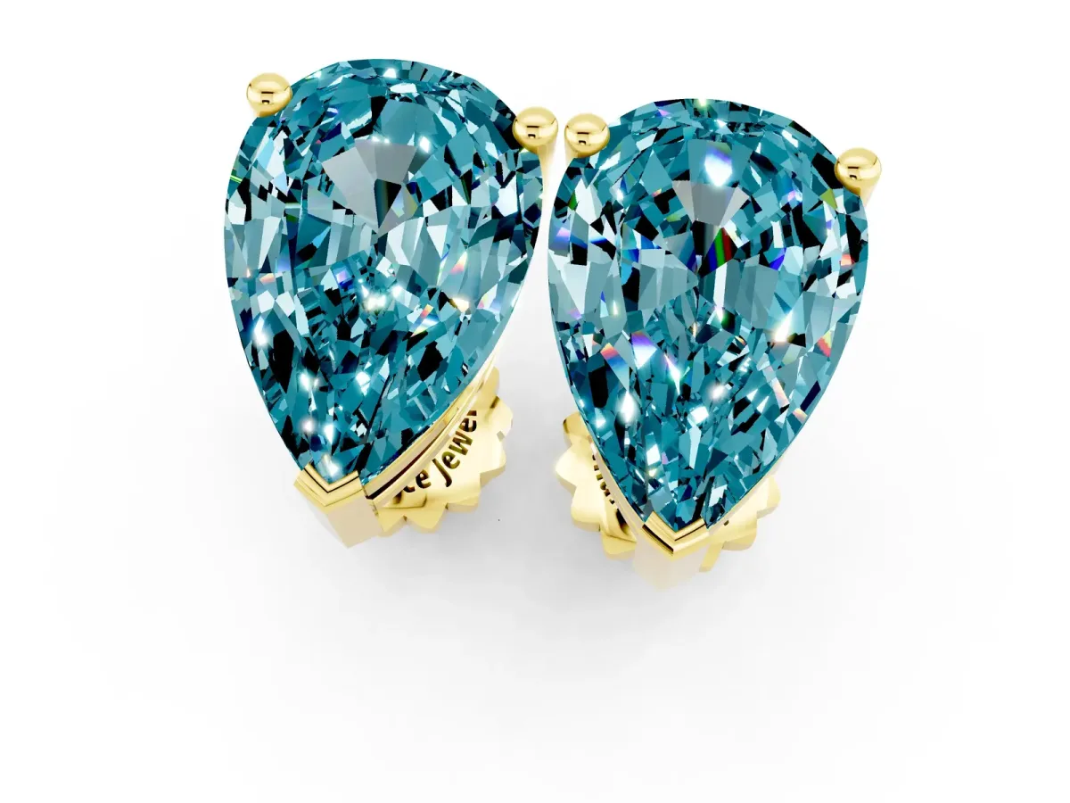 Pear Cut Blue Topaz Stud Earrings Yellow gold