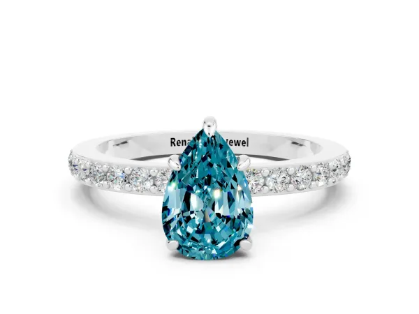 Pear Cut Blue Topaz Solitaire Engagement Ring with Pavé Band and Four-Prong Setting Platinum