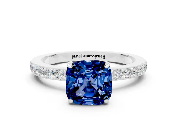 Cushion Cut Blue Sapphire Solitaire Engagement Ring with Pavé Band and Four-Prong Setting Platinum