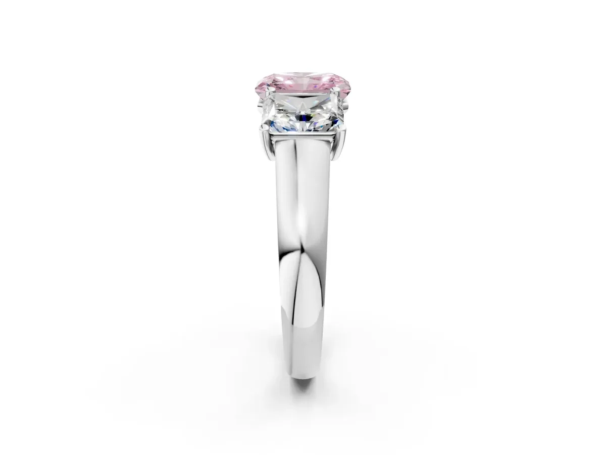 Fancy Pink Radiant Cut Three-Stone Diamond Ring with Prong Setting on a Classic Band Platinum