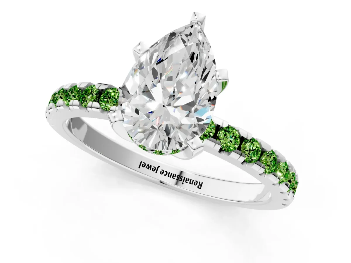 Pear Cut Diamond Solitaire Ring with Round Peridot Pavé Band and Four-Prong Setting Silver