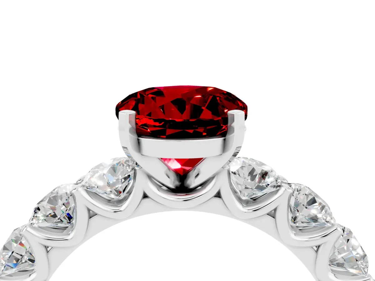 Round Cut Ruby Prong Setting with Side Stones on a Pave Band Platinum