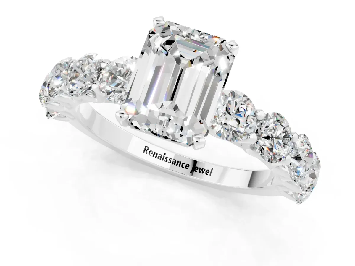 Emerald Cut Moissanite Prong Setting with Side Stones on a Pave Band Platinum