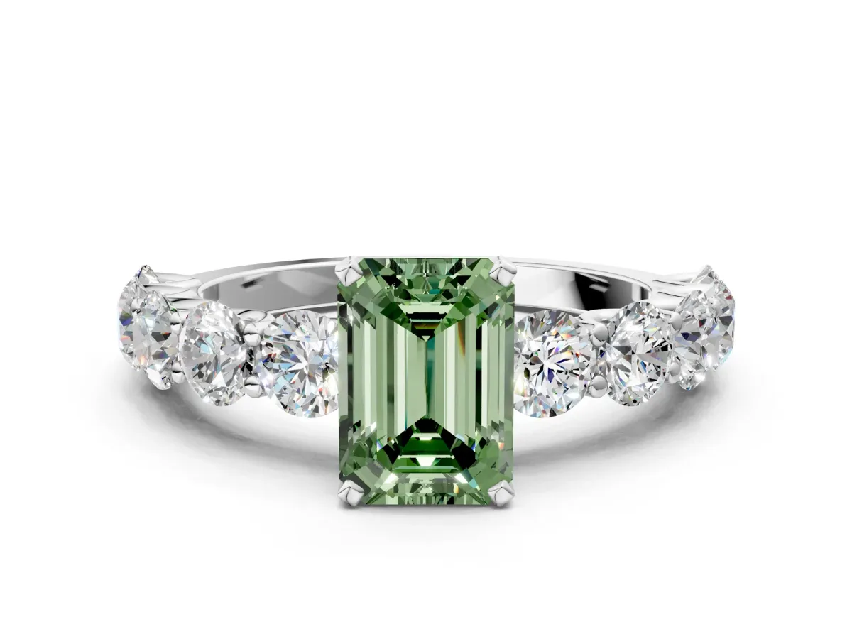 Fancy Green Emerald Cut Diamond Prong Setting with Side Stones on a Pave Band Silver