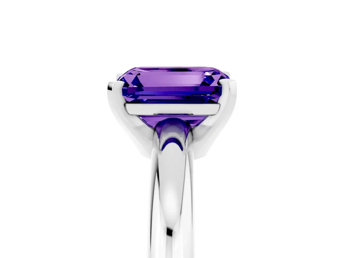 Emerald Cut Tanzanite Solitaire Engagement Ring with Round Band and Four-Prong Setting Silver