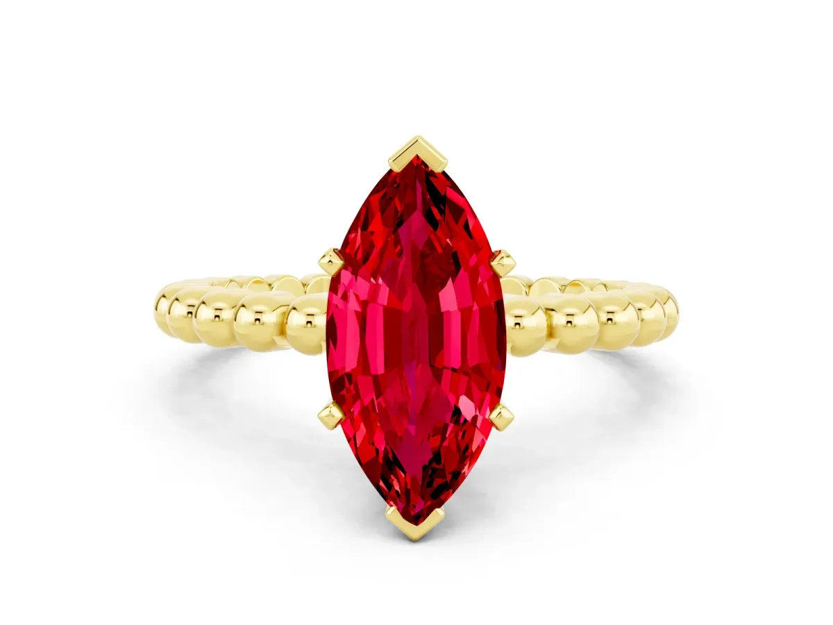 Marquise Cut Ruby Solitaire Ring with Beaded Band and Prong Setting Yellow gold