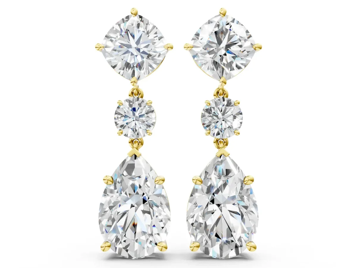 Cushion, Round and Pear Diamond Three-Stone Drop Earrings Yellow gold
