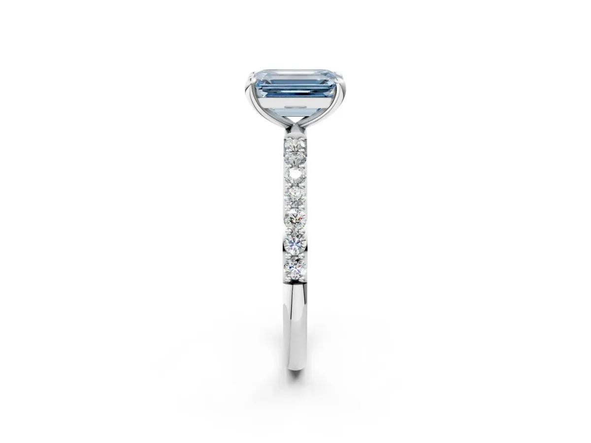 Fancy Blue Emerald Cut Diamond Solitaire Ring with Round Pavé Band and Prong Setting Silver