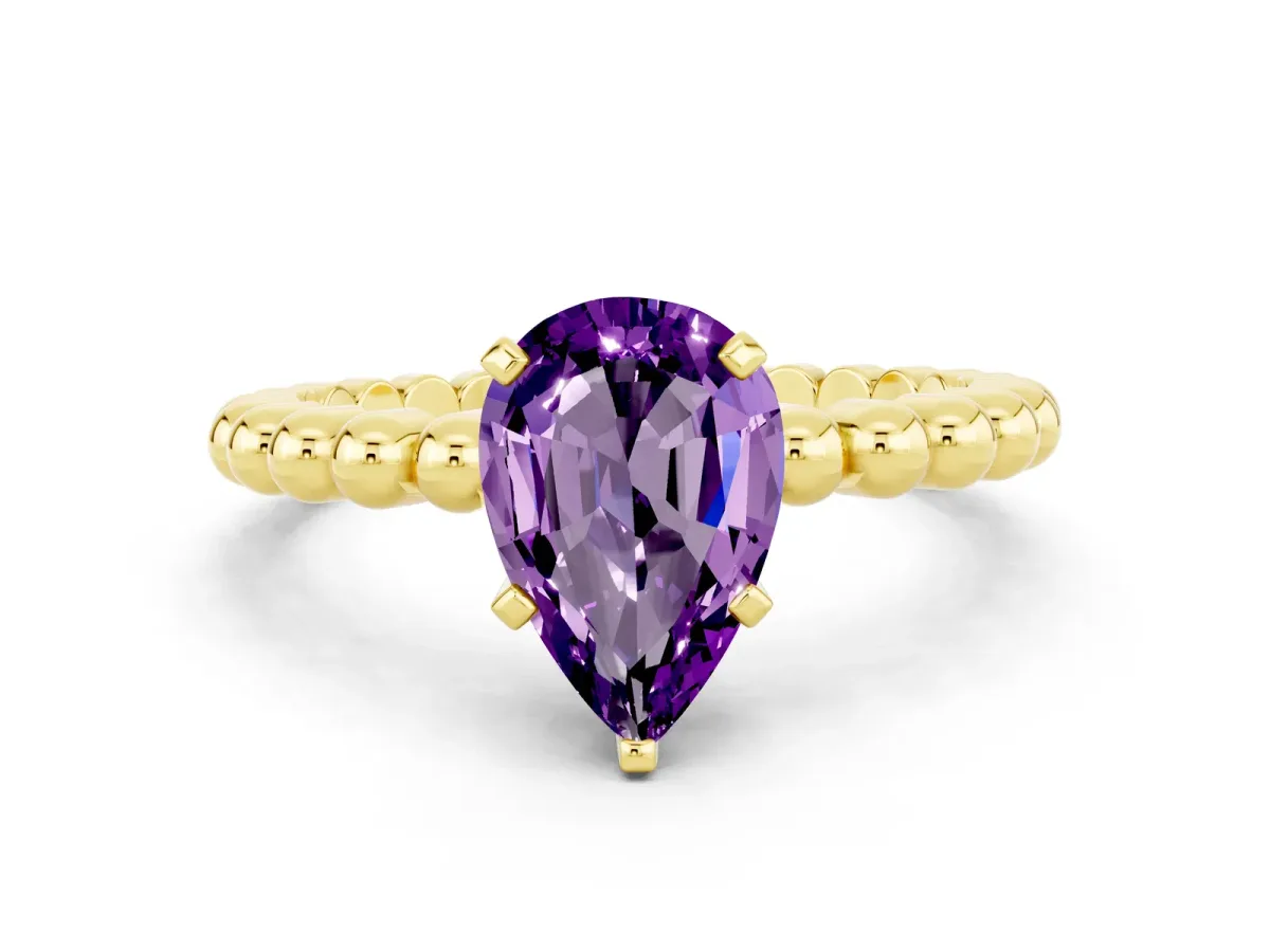 Pear Cut Amethyst Solitaire Ring with Beaded Band and Prong Setting Yellow gold