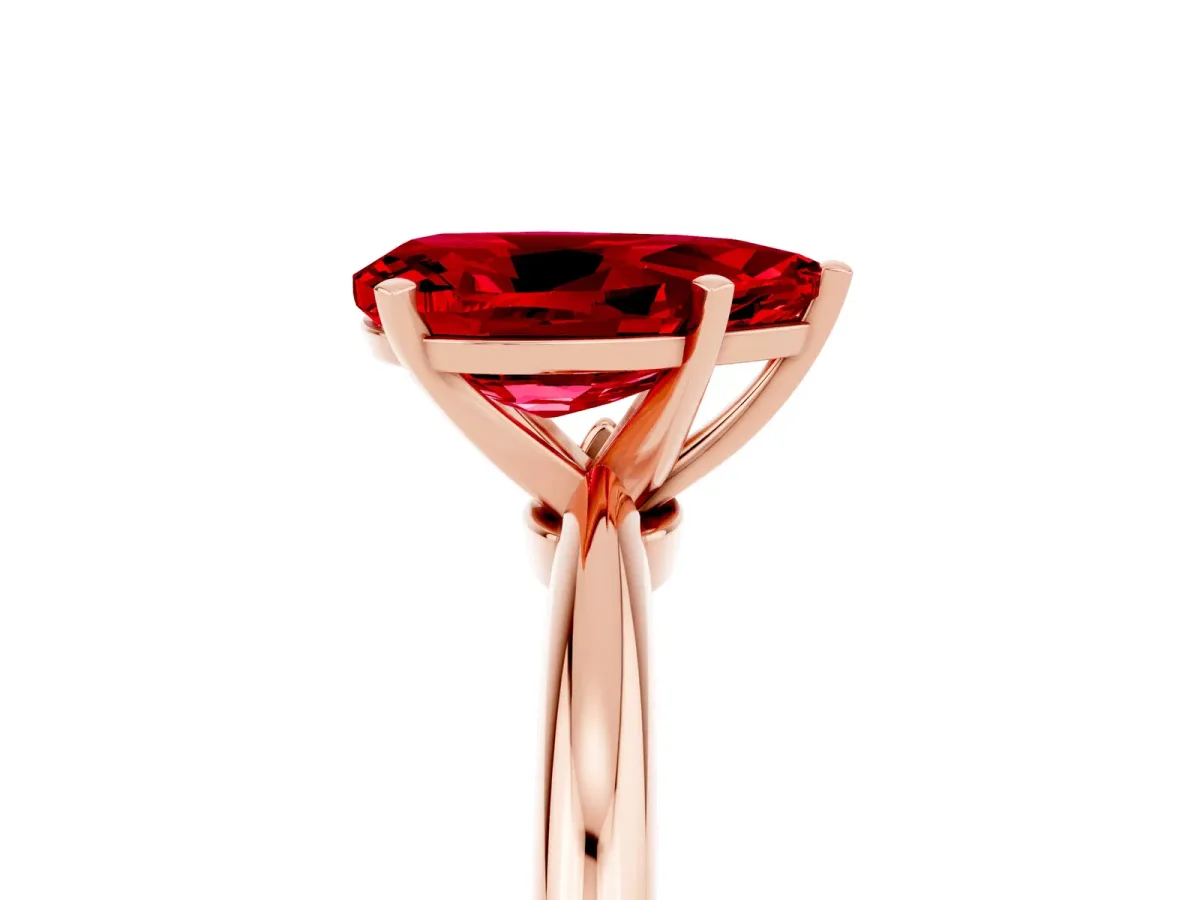 Pear Cut Ruby Solitaire Ring with Six-Prong Setting and Classic Band Rose gold