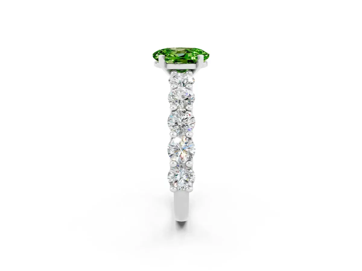 Oval Cut Peridot Prong Setting with Side Stones on a Pave Band Platinum