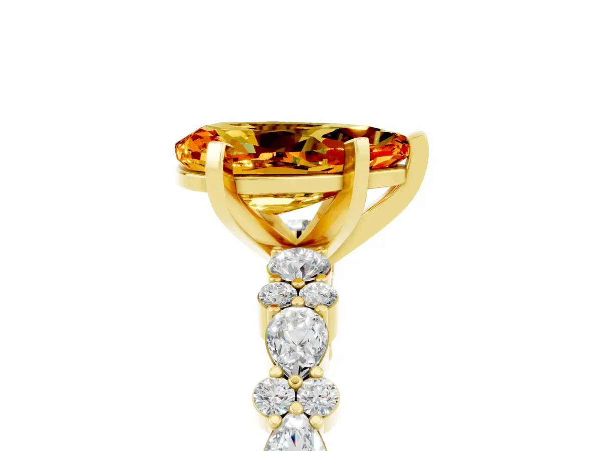 Pear Cut Citrine Side Stone Solitaire Ring with Round and Four-Prong Setting Yellow gold