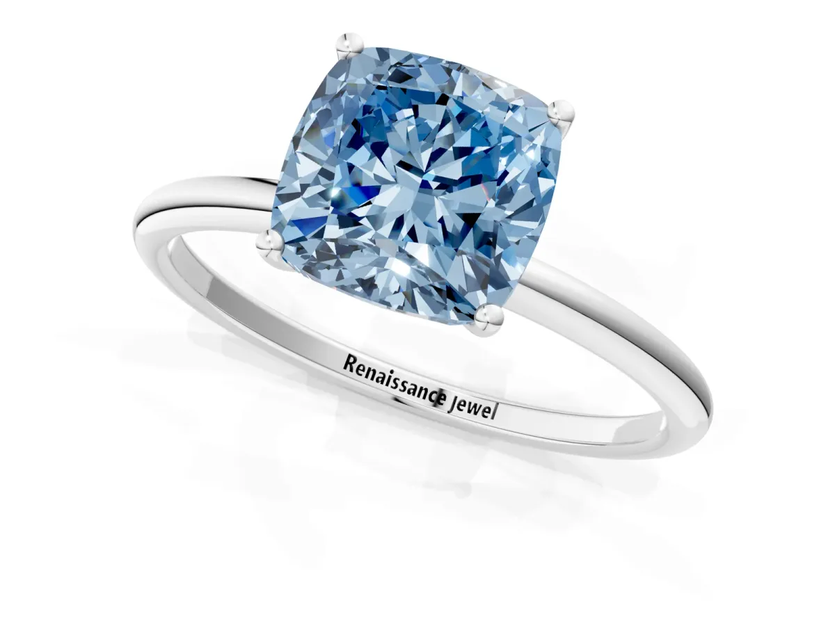 Fancy Blue Cushion Cut Cut Solitaire Engagement Ring with Thin Band and Four-Prong Setting Silver
