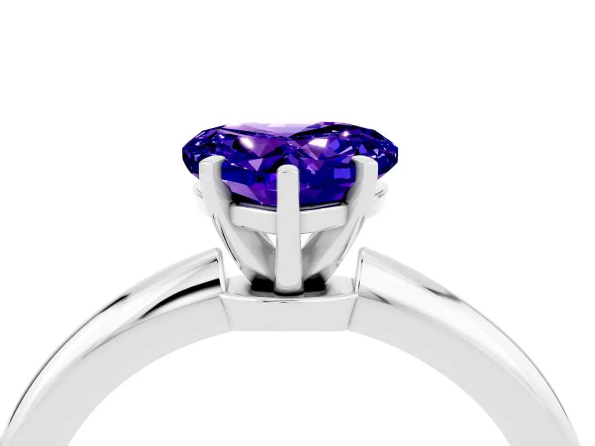 Heart Cut Tanzanite Solitaire Ring with Six-Prong Setting and Classic Band Silver