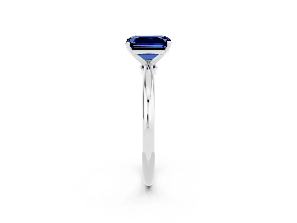 Emerald Cut Blue Sapphire Solitaire Ring with Six-Prong Setting and Classic Band Platinum