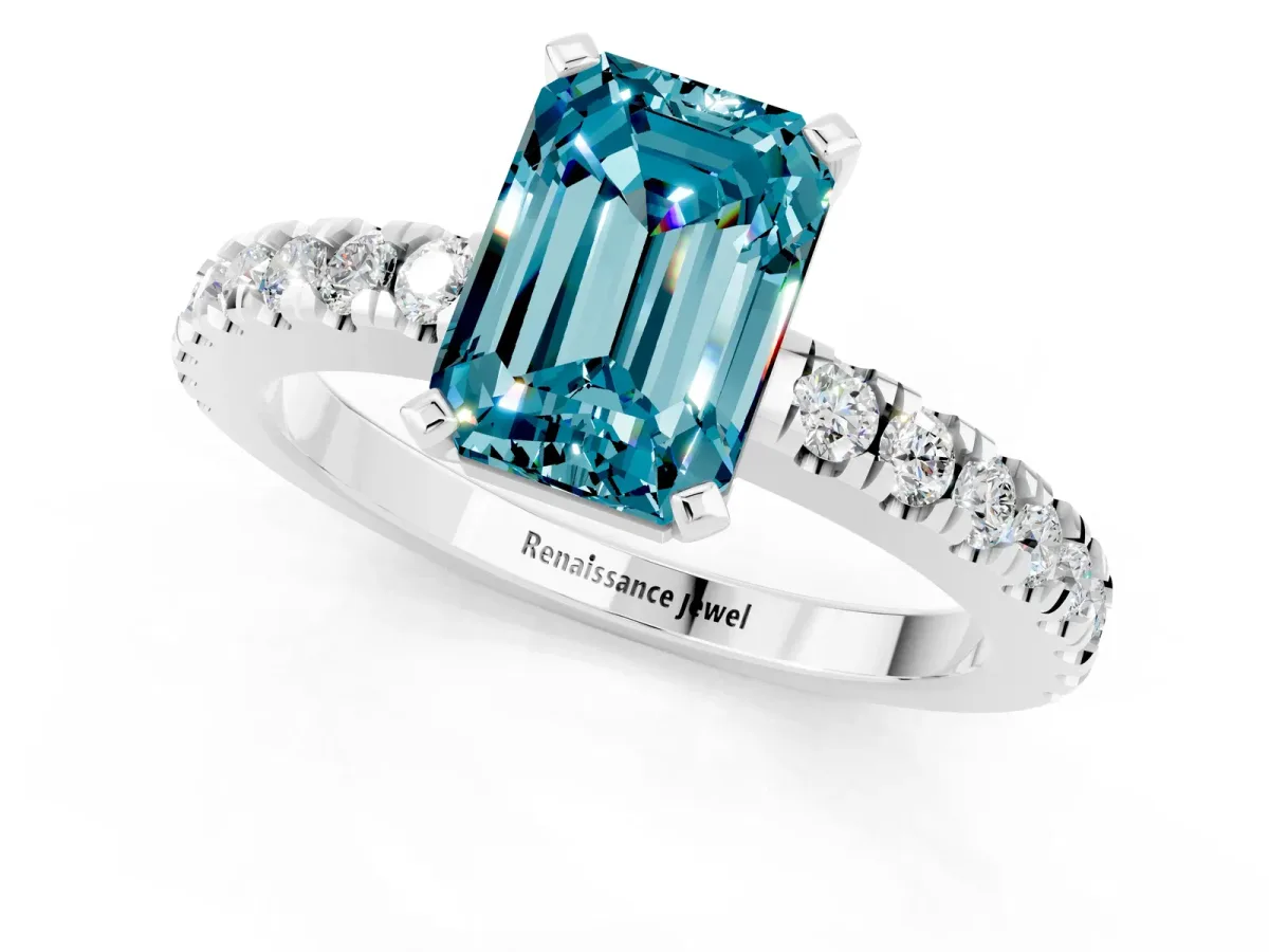 Emerald Cut Solitaire Blue Topaz with Pavé Band and Four-Prong Setting Silver