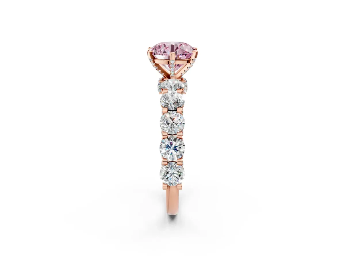 Fancy Pink Round Cut Diamond Side Stone Engagement Ring with Four-Prong Setting Rose gold