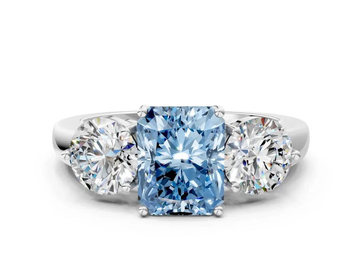 Fancy Blue Radiant Cut Diamond Three-Stone Ring with Prong Setting and Classic Band Platinum