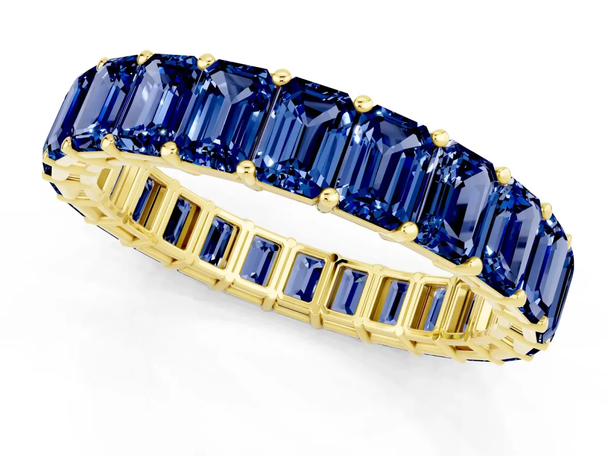 Emerald Cut Blue Sapphire Eternity Band with Shared Prong Setting Yellow gold