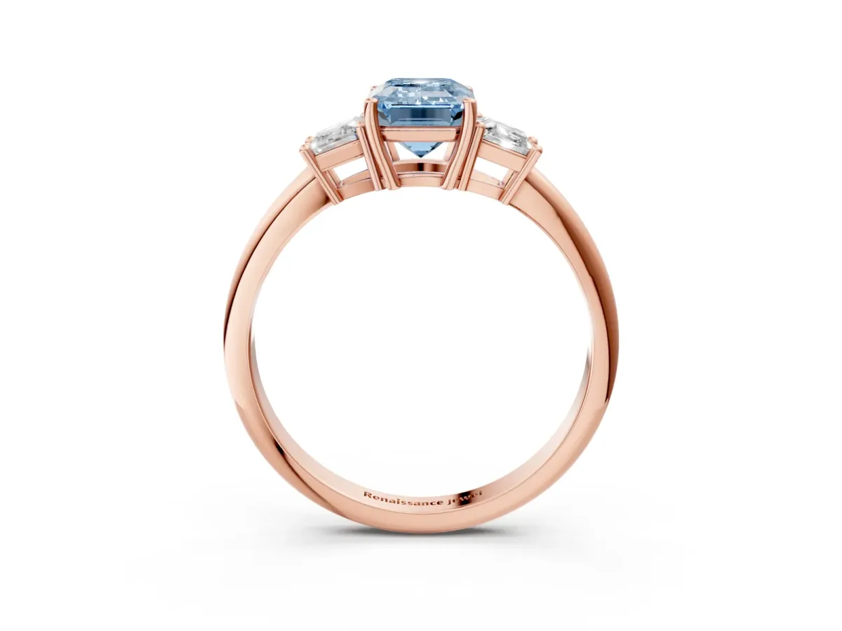 Fancy Blue Emerald Cut Diamond Three-Stone Ring with Trapezoid Side Stones and Prong Setting Rose gold