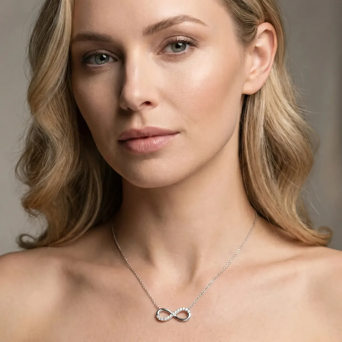 Infinity Pendant with Round Brilliant Diamonds in Pavé Setting Silver