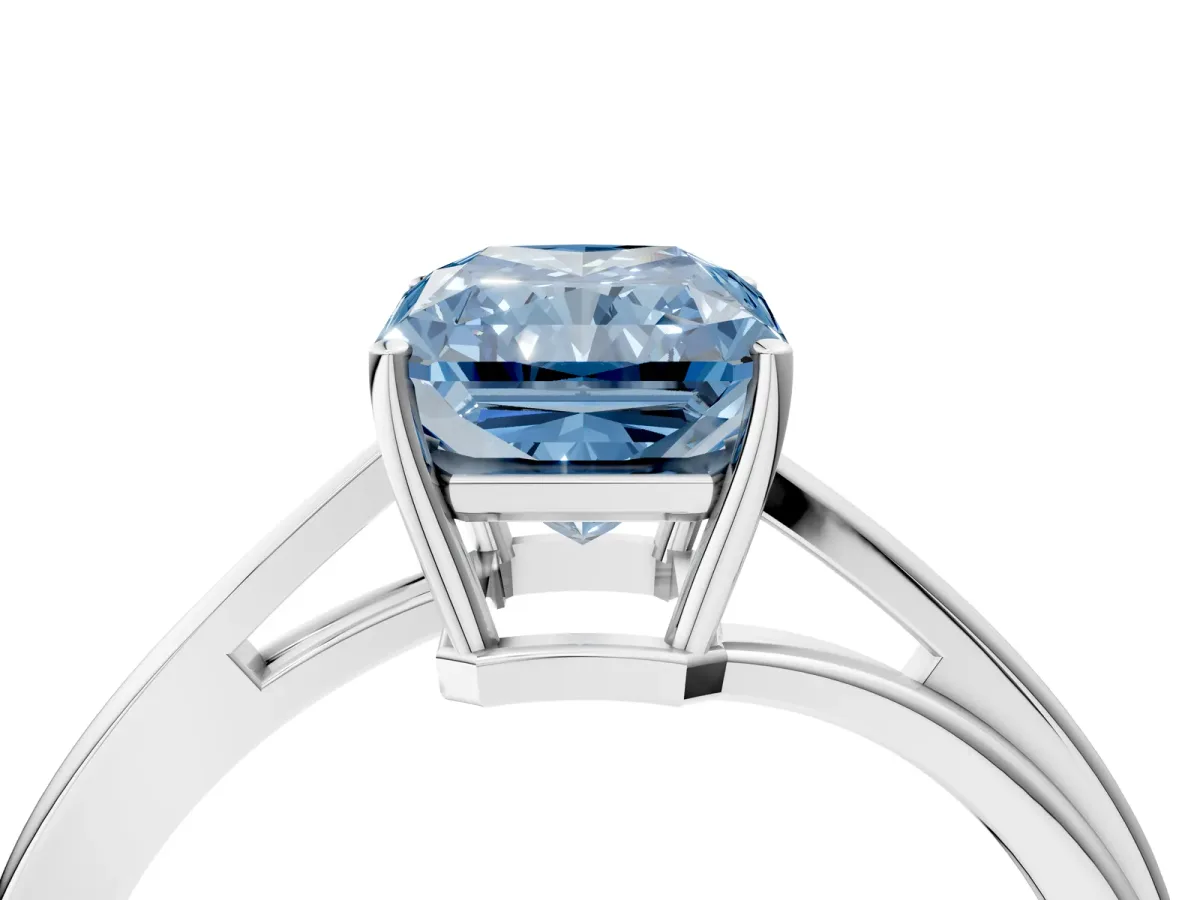 Fancy Blue Radiant Cut Cut Solitaire Twist Band Ring with Four-Prong Setting Platinum