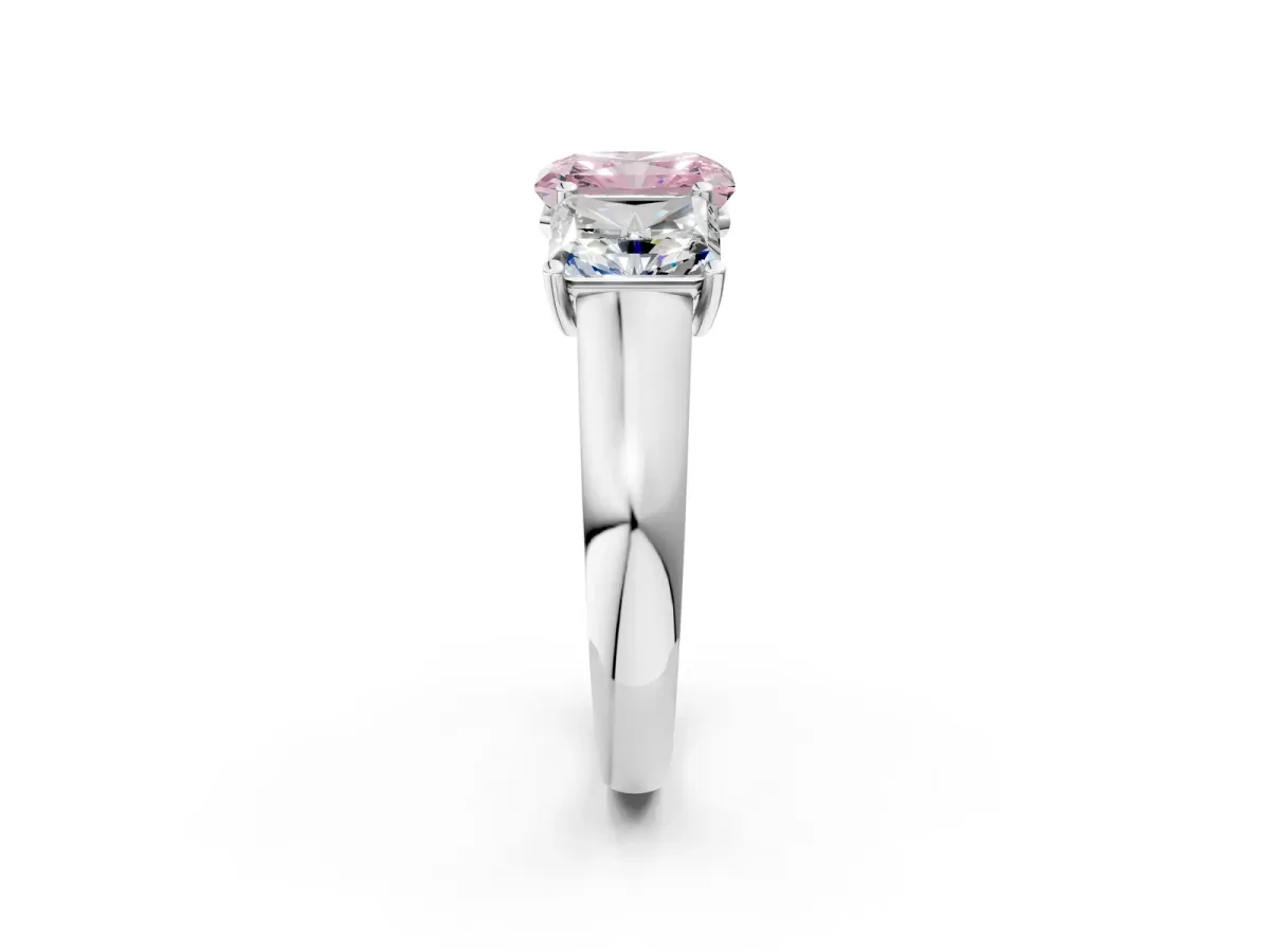 Fancy Pink Radiant Cut Three-Stone Diamond Ring with Prong Setting on a Classic Band Platinum