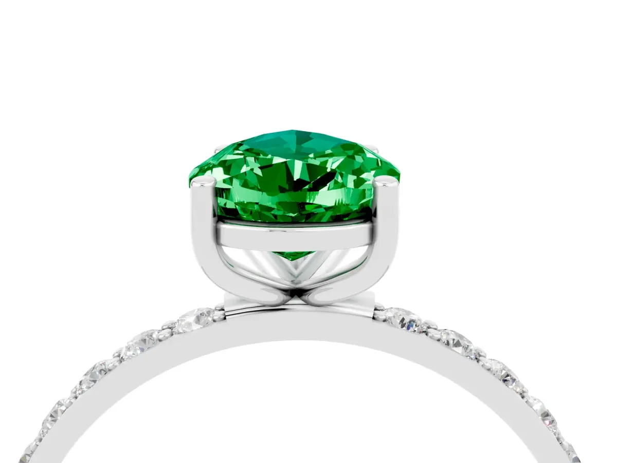 Pear Cut Emerald Solitaire Ring with Round Pavé Band and Prong Setting White gold