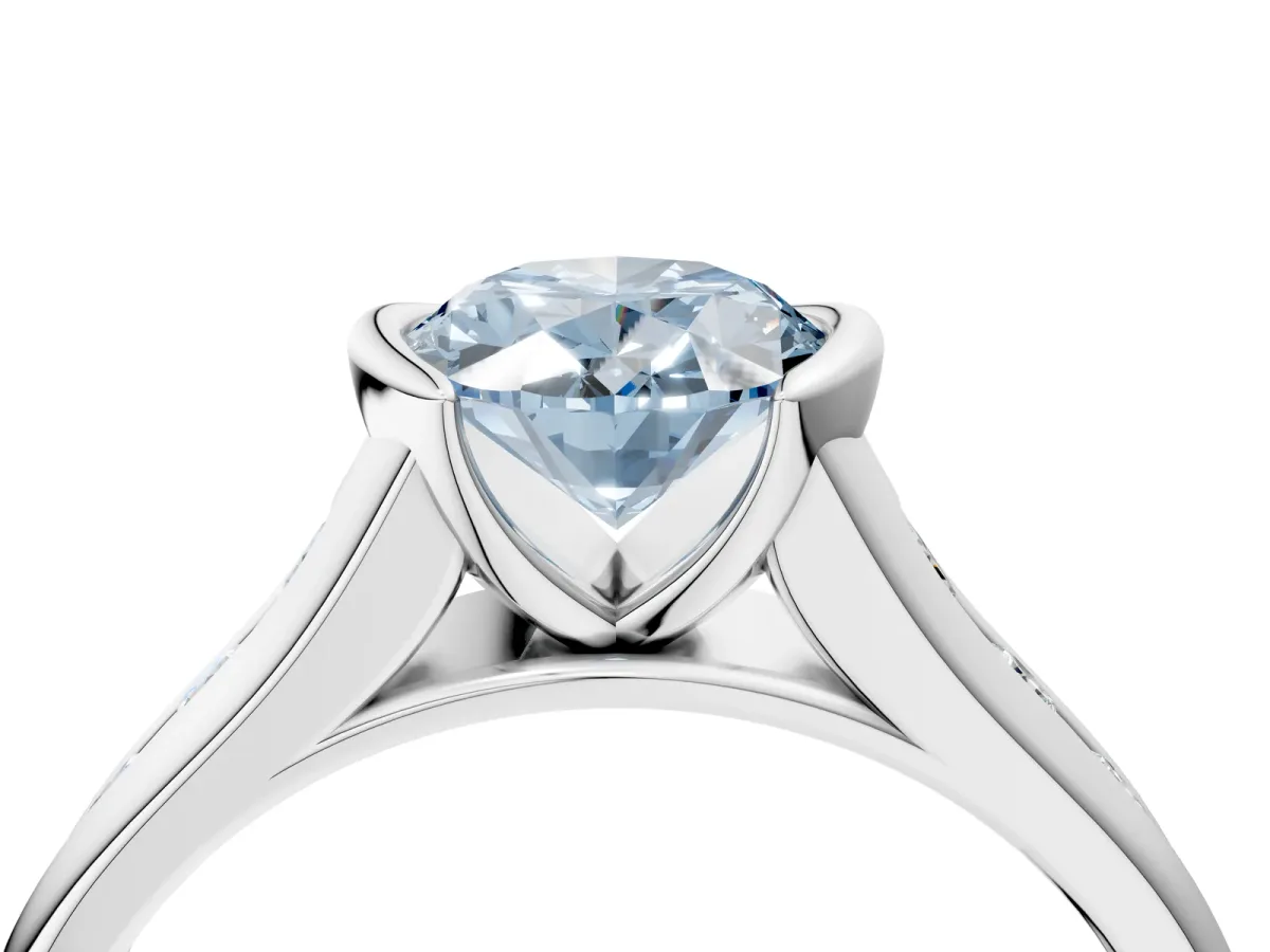 Fancy Blue Oval Cut Solitaire Bezel-Set Diamond Ring with Channel-Set Band Platinum