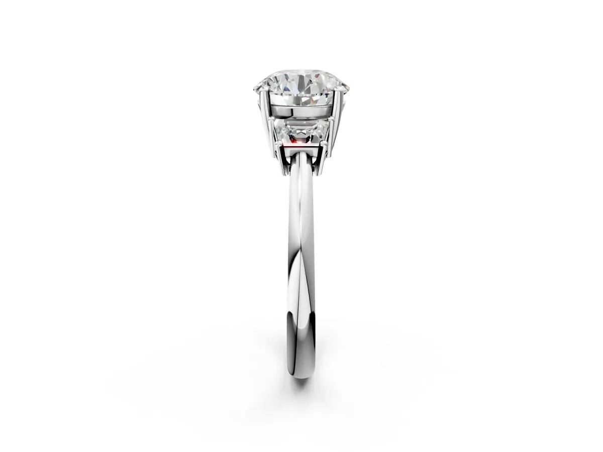 Round Cut Diamond Three-Stone Ring with Trapezoid Side Stones and Prong Setting Platinum