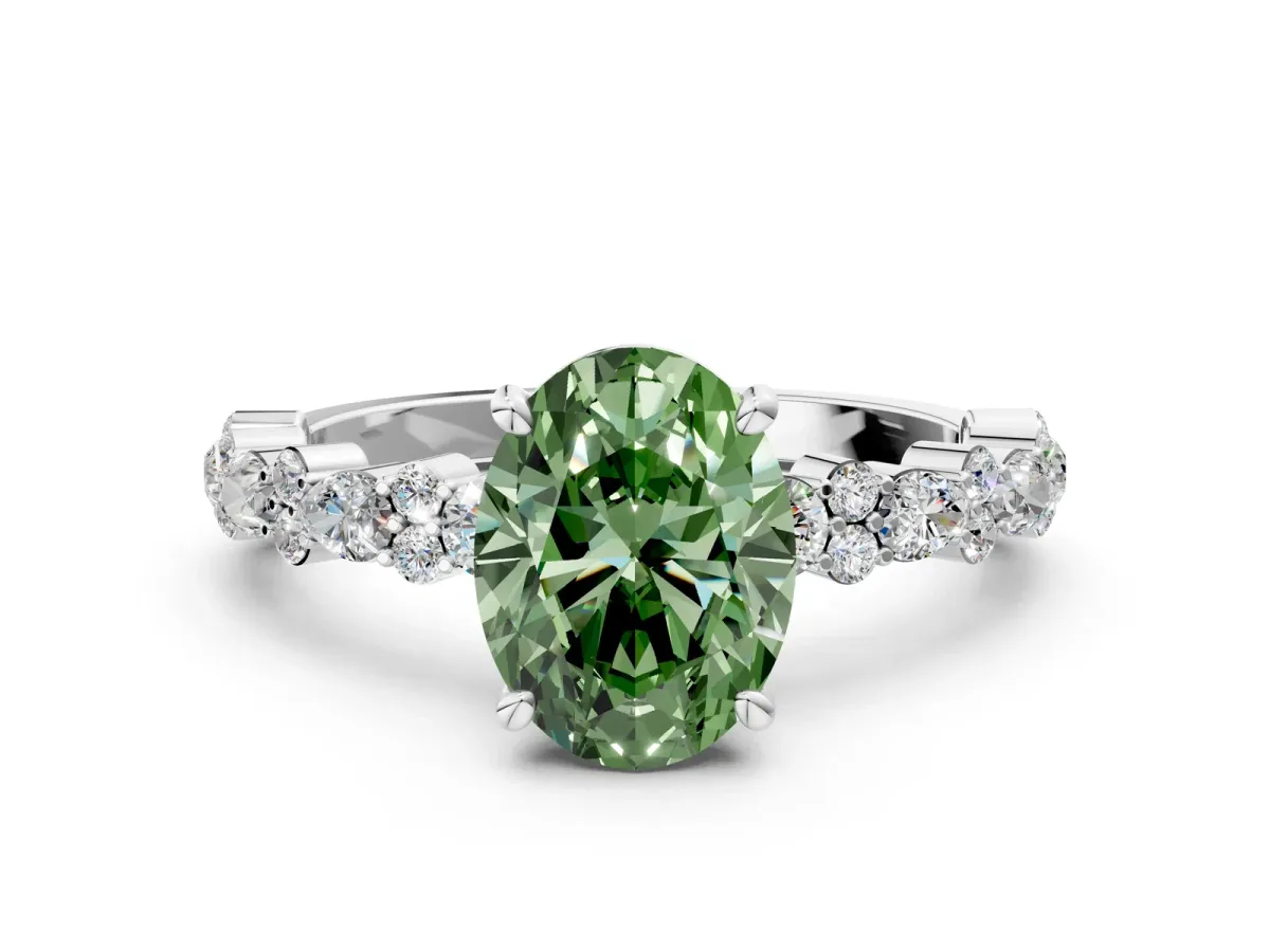 Fancy Green Oval Cut Diamond Side Stone Solitaire Ring with Round and Four-Prong Setting White gold