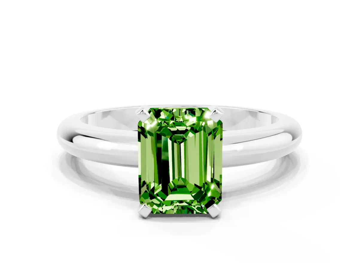 Emerald Cut Peridot Solitaire Engagement Ring with Round Band and Four-Prong Setting Silver