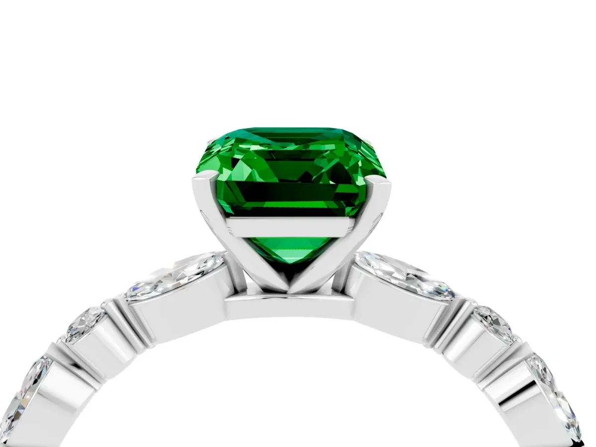 Emerald Cut Emerald Ring with Marquise and Round Side Stones and Four-Prong Setting Platinum