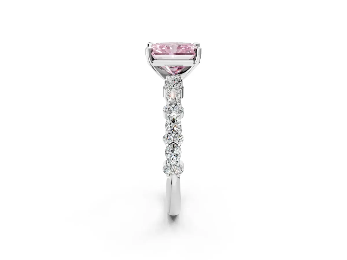 Fancy Pink Radiant Cut Diamond Side Stone Solitaire Ring with Round and Four-Prong Setting Platinum