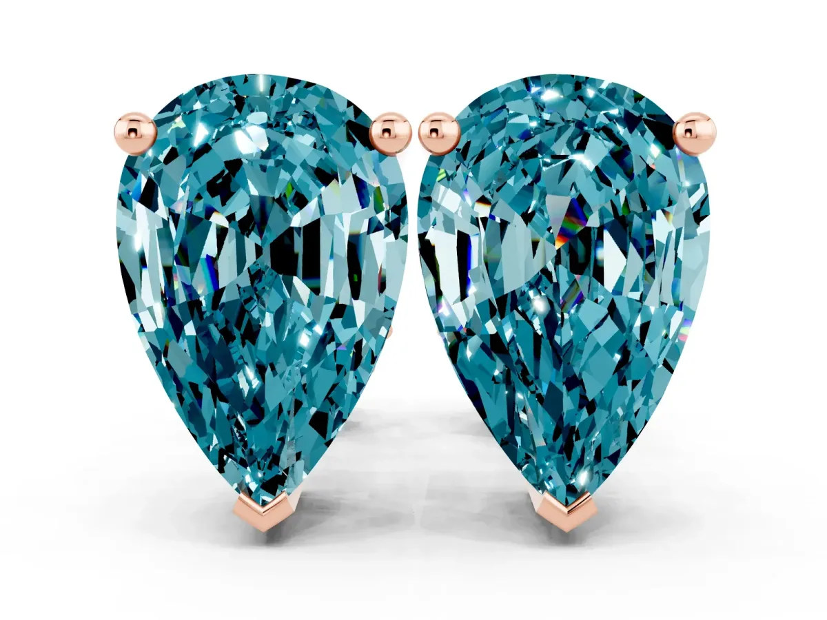 Pear Cut Blue Topaz Stud Earrings Rose gold