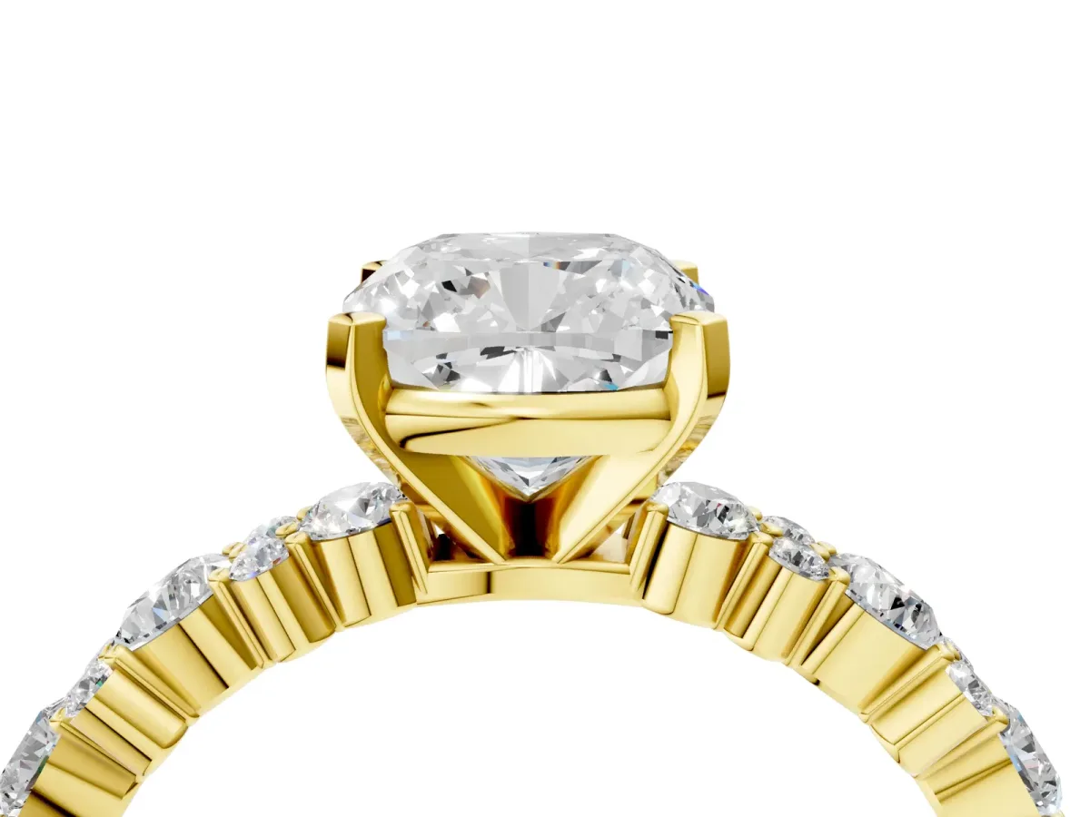 Cushion Cut Diamond Side Stone Solitaire Ring with Round and Four-Prong Setting Yellow gold
