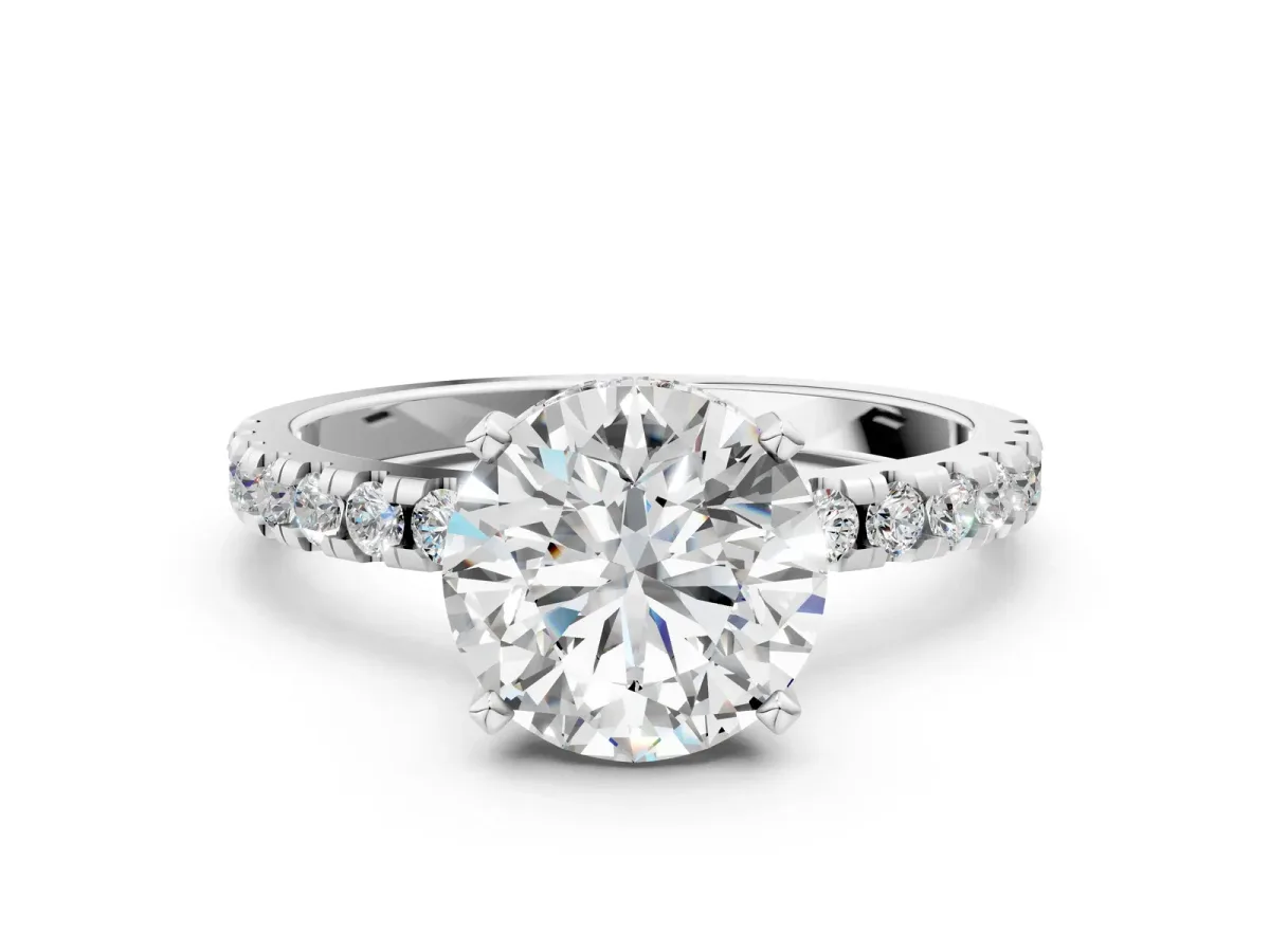 Round Cut Diamond Solitaire Ring with Round Pavé Band and Four-Prong Setting Platinum