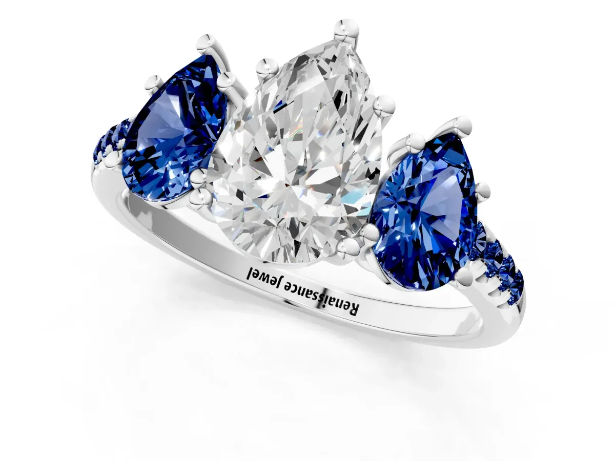 Three-Stone Pear Cut Diamond Ring with Round Blue Sapphire Pavé Band and Prong Setting Silver