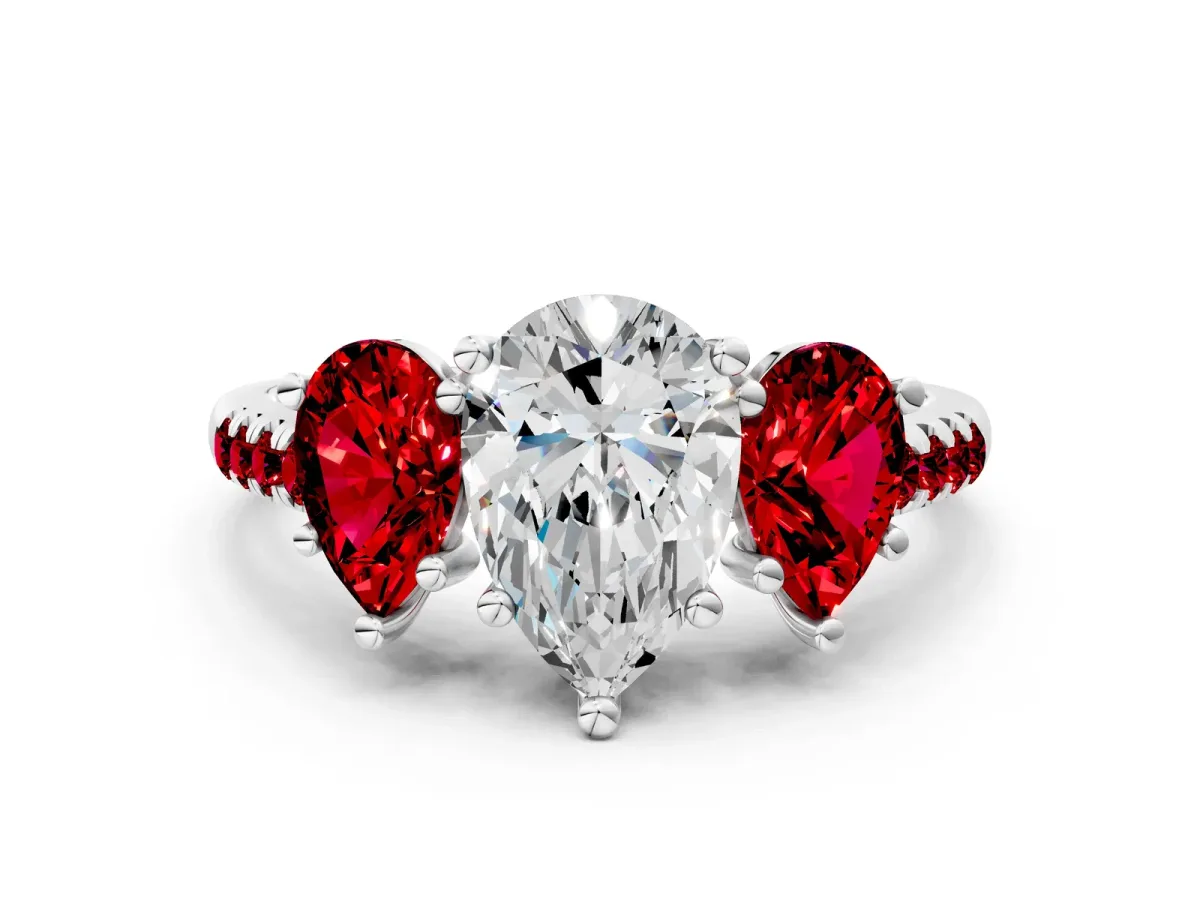 Three-Stone Pear Cut Diamond Ring with Round Ruby Pavé Band and Prong Setting Platinum