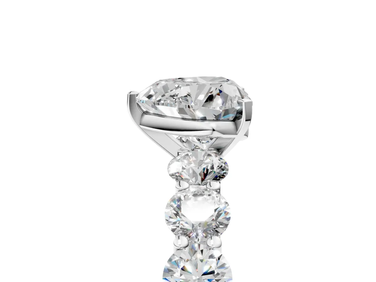 Heart Cut Diamond Prong Setting with Side Stones on a Pave Band Silver