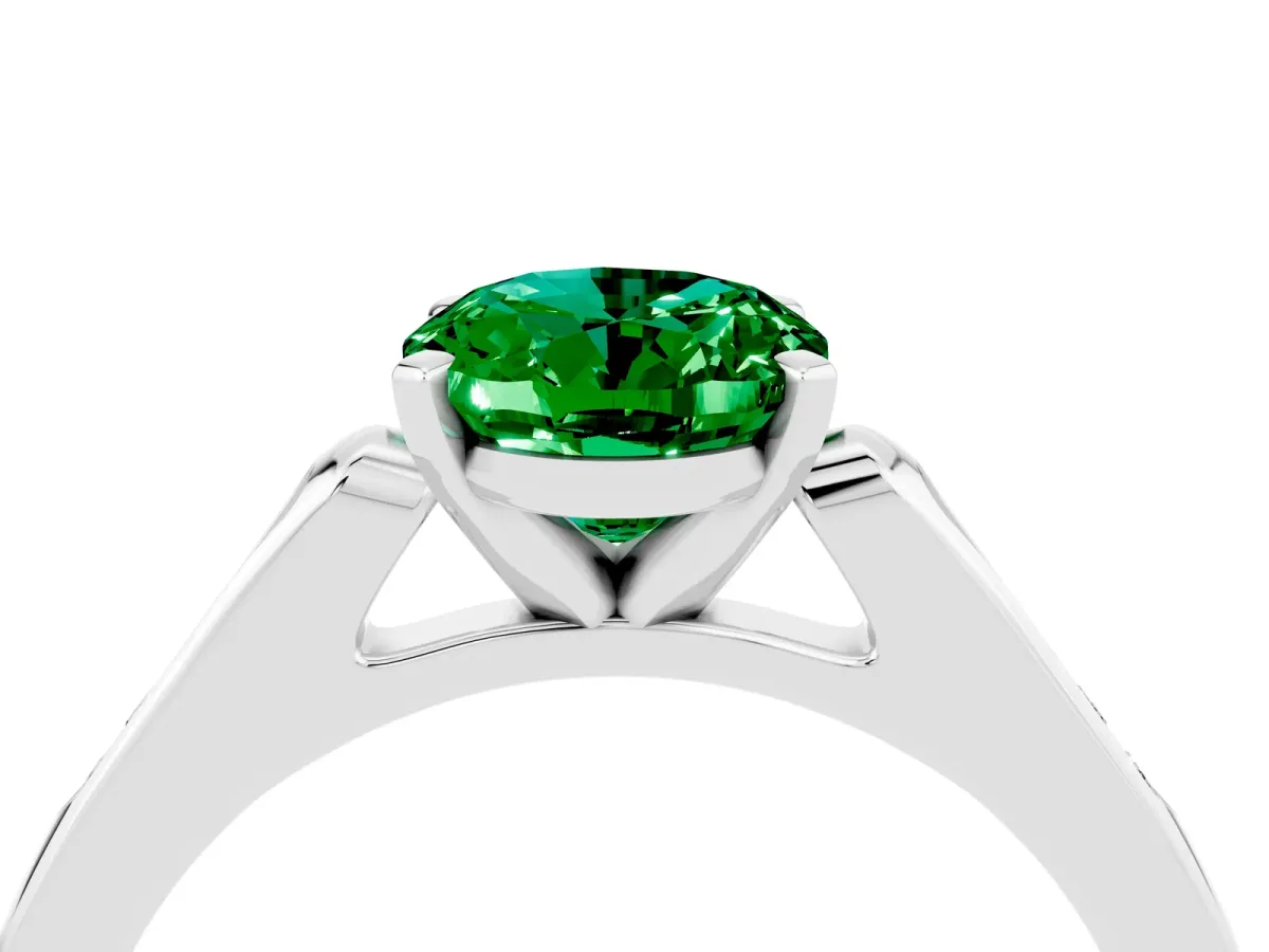 Oval Cut Emerald Solitaire Ring with Channel Set Round Band and Prong Setting White gold