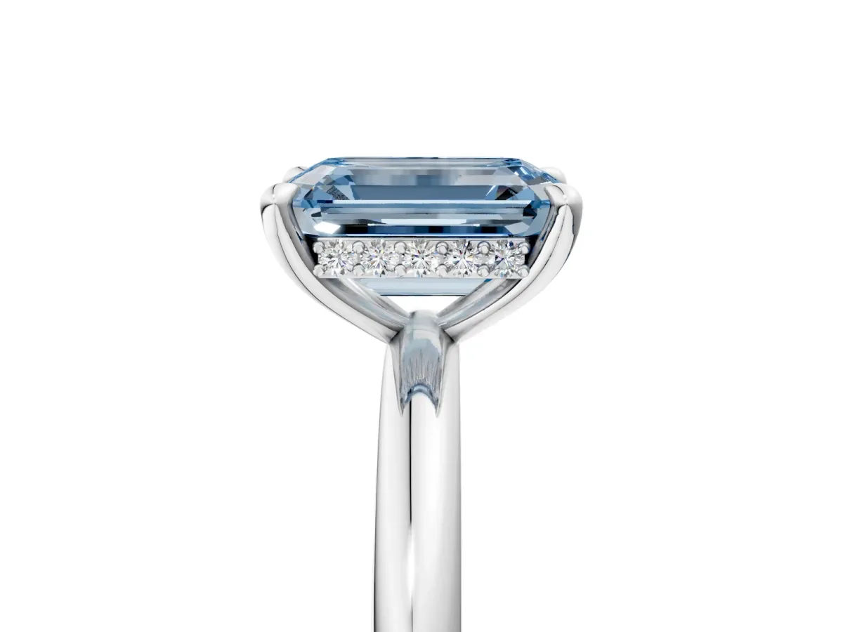 Fancy Blue Emerald Cut Diamond Solitaire Ring with Thin Band and Four-Prong Setting Platinum