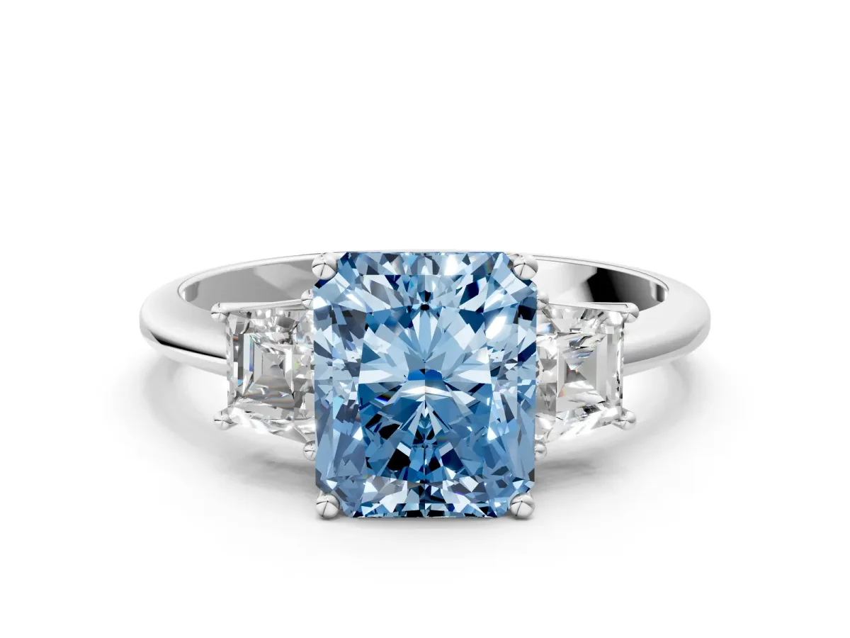 Fancy Blue Radiant Cut Diamond Three-Stone Ring with Trapezoid Side Stones and Prong Setting Silver