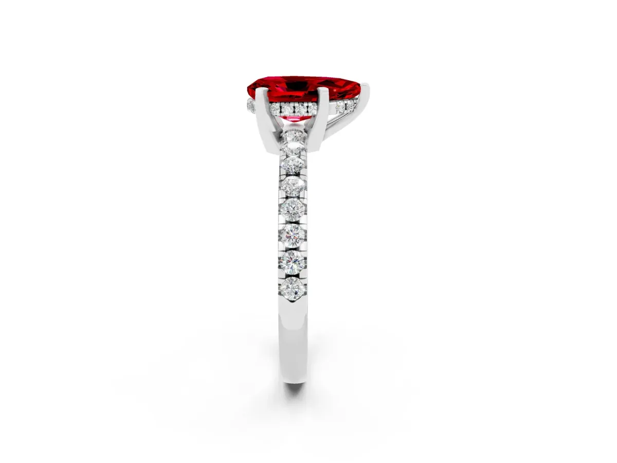 Pear Cut Ruby Solitaire Ring with Round Pavé Band and Four-Prong Setting Silver