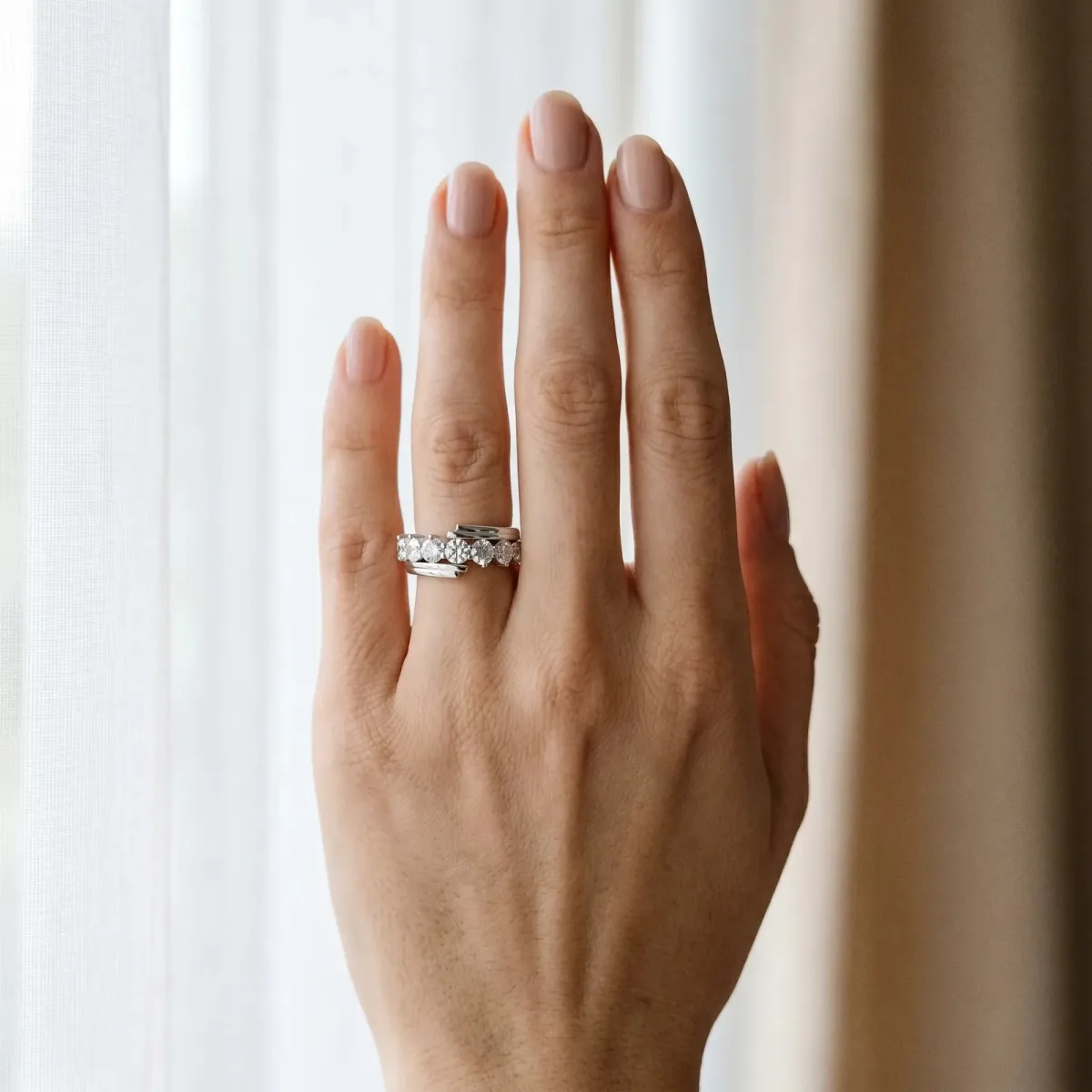 Round Diamond Wave Band with Channel and Shared Prong Setting Platinum