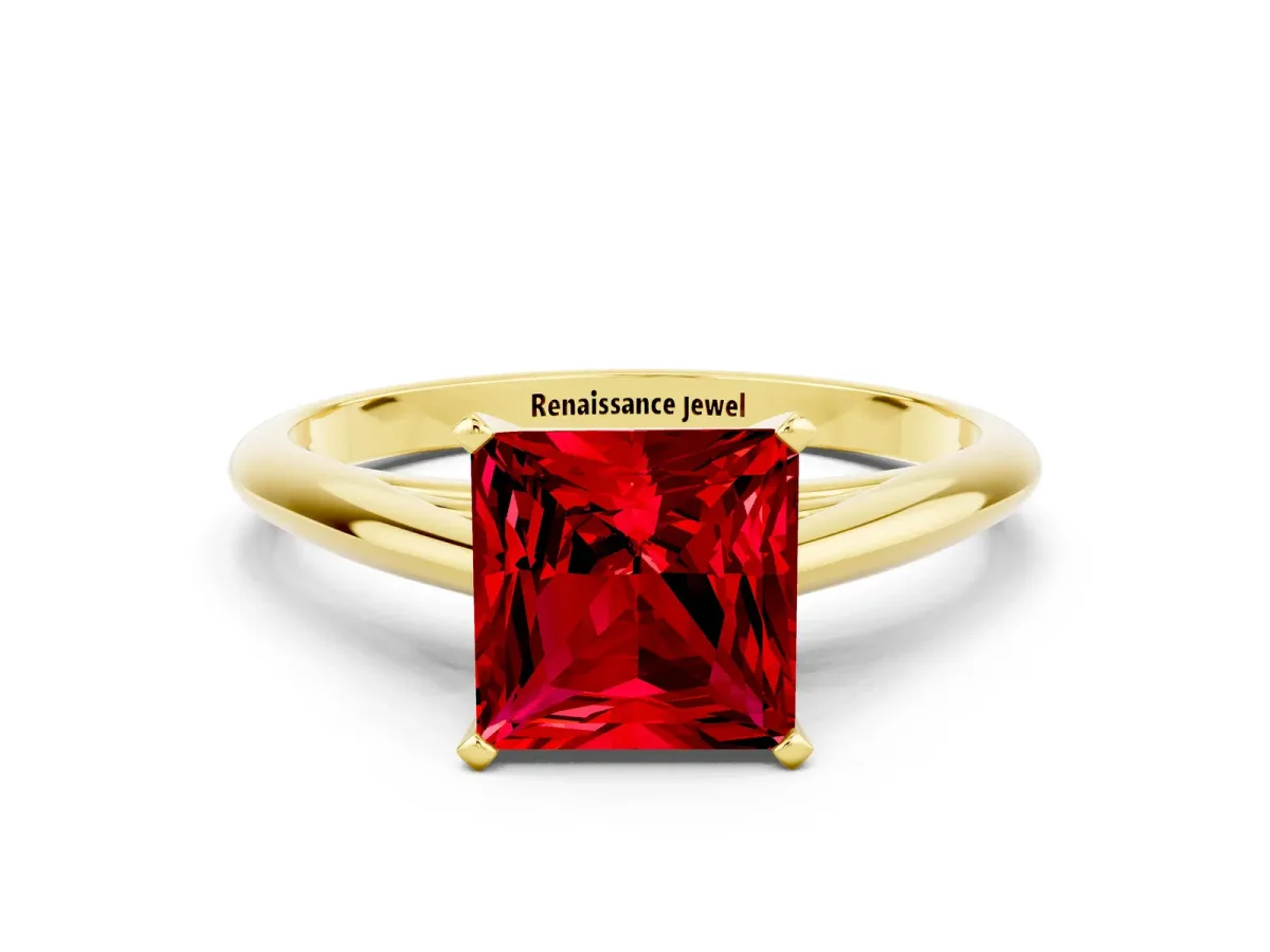 Princess Cut Ruby Solitaire Engagement Ring with Cathedral Setting and Four-Prong Mount Yellow gold