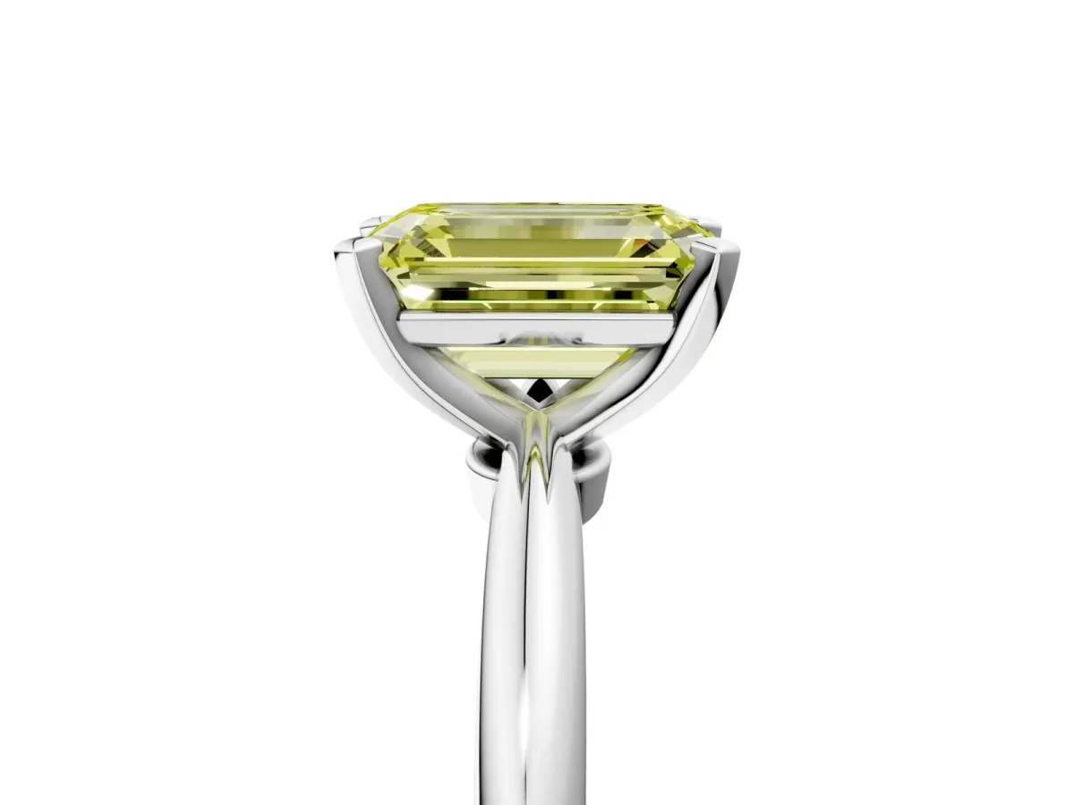Fancy Yellow Emerald Cut Diamond Solitaire Ring with Six-Prong Setting and Classic Band Platinum