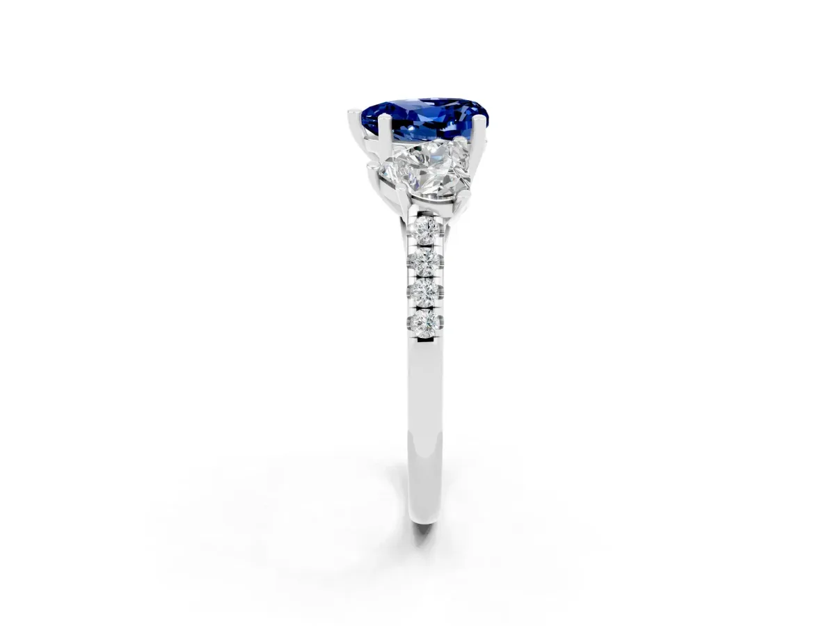 Three-Stone Heart Cut Blue Sapphire Ring with Round Pavé Band and Prong Setting Silver